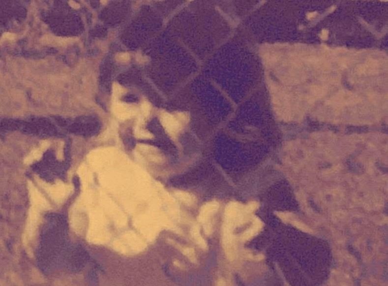 Shary at fence searching for a way out_Confinement