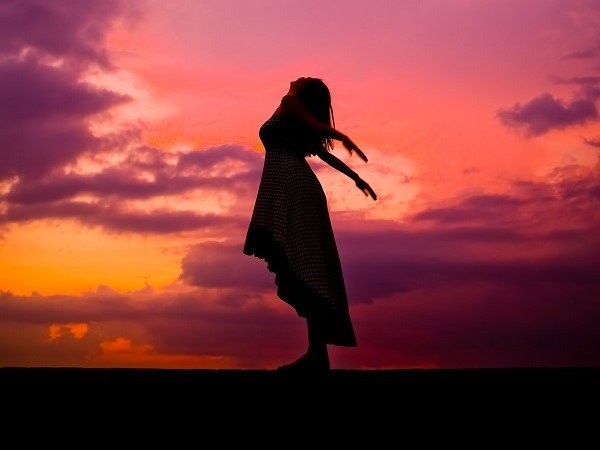 Silhouette female arching towards the sunset sky - Healer of the Soul Blogpost image