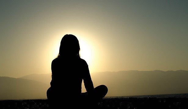 Woman silhouette facing towards sun Sharons Story Part Two